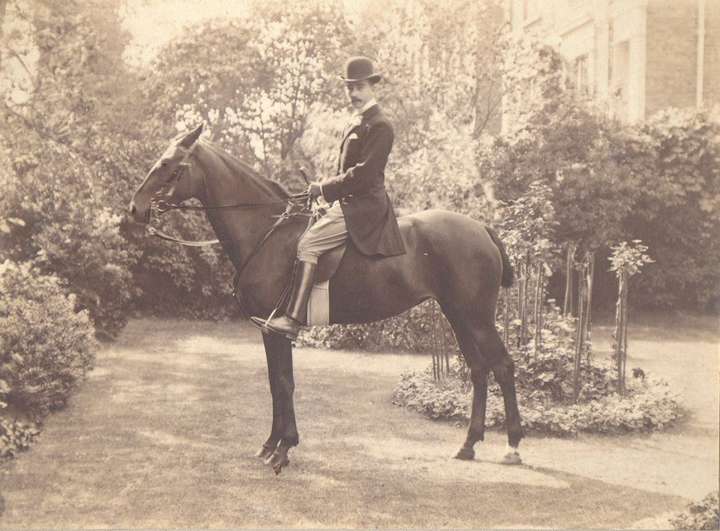 Sepia photo of Michael's father Edward Gryspeerdt, on a horse in the back garden of a house in Croydon, c.1910.